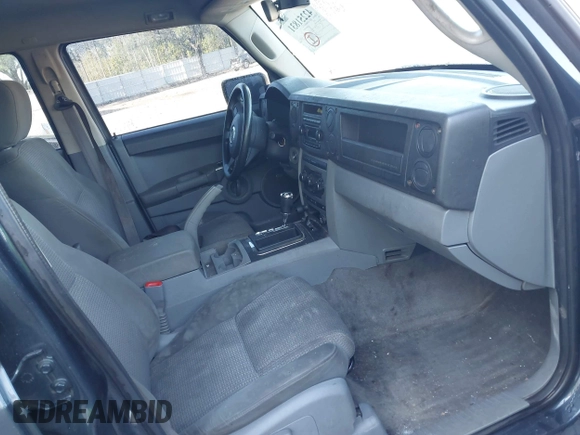 2007 Jeep Commander Sport z VIN 1J8HG48K67C686008, wystawiony jako IAAI lot #42251831 z przebiegiem 197 759 mil mil oraz . Historia ofert i sprzedaży dostępna na DreamBid. Obrazek 5.