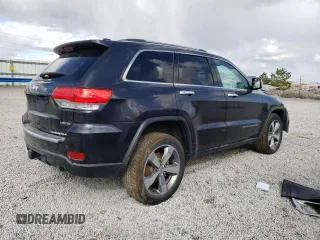 2015 Jeep Grand Cherokee Limited with VIN 1C4RJFBG6FC924659, listed as a Copart auction lot 51552015 with 99,912 mi miles and Salvage Title. Bid and sale history available at carsss.com. Image 3.