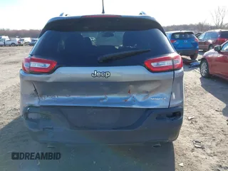 2014 Jeep Cherokee Latitude with VIN 1C4PJMCSXEW125737, listed as a IAAI auction lot 41863778 with 120,226 mi miles. Bid and sale history available at carsss.com. Image 16.