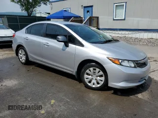 2012 Honda Civic LX с VIN 19XFB2F5XCE348936, выставлен на аукционе Copart как лот 60262265 с пробегом 199 721 миль миль и Списание • Salvage title. История ставок и продаж доступна на DreamBid. Изображение 4.