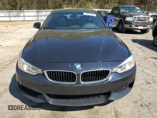 2015 BMW 4 Series 428i xDrive with VIN WBA4A7C58FD413734, listed as a Copart auction lot 50252325 with 74,629 mi miles and Salvage title. Bid and sale history available at DreamBid. Image 5.