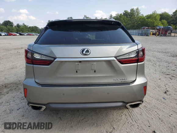 2017 Lexus RX 350 z VIN 2T2BZMCA5HC108427, wystawiony jako Copart lot #60498915 z przebiegiem 103 071 mil mil oraz Szkoda całkowita • Salvage title. Historia ofert i sprzedaży dostępna na DreamBid. Obrazek 6.