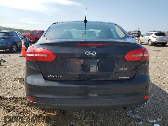 2016 Ford Focus SE with VIN 1FADP3F21GL228871, listed as a Copart auction lot 63506525 with 62,756 mi miles and Salvage title. Bid and sale history available at DreamBid. Image 6.