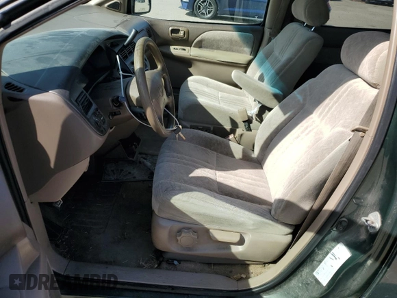 1999 Toyota Sienna LE with VIN 4T3ZF13C9XU097657, listed as a Copart auction lot 79008884 with 361,011 mi miles and Salvage Title. Bid and sale history available at carsss.com. Image 7.