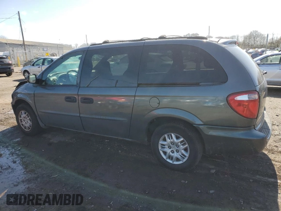2004 Dodge Caravan SE with VIN 1D4GP24R04B520727, listed as a Copart auction lot 52002475 with 164,954 mi miles and Salvage title. Bid and sale history available at DreamBid. Image 2.