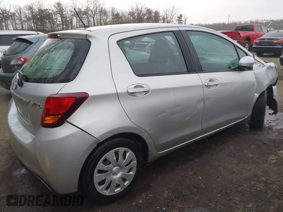 2015 Toyota Yaris L with VIN VNKKTUD33FA028588, listed as a IAAI auction lot 41575230 with 148,071 mi miles. Bid and sale history available at carsss.com. Image 4.