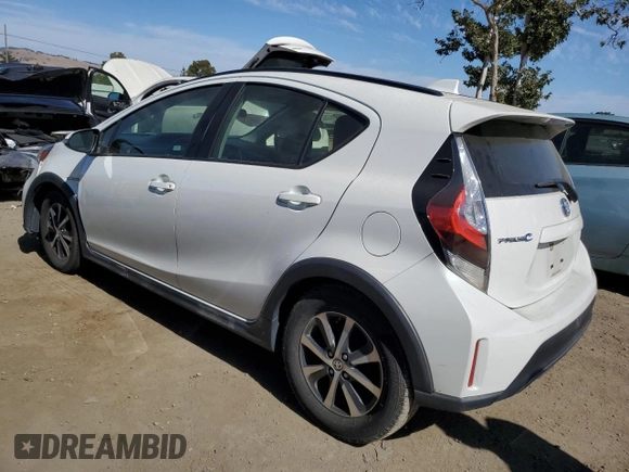 2018 Toyota Prius One with VIN JTDKDTB36J1604525, listed as a Copart auction lot 63838575 with 59,212 mi miles and Salvage title. Bid and sale history available at DreamBid. Image 2.