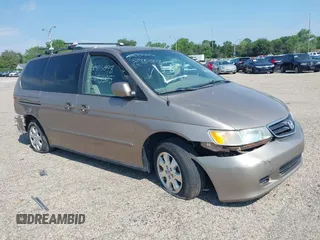 2004 Honda Odyssey EX-RES z VIN 5FNRL188X4B128042, wystawiony jako IAAI lot #32903098 z przebiegiem 213 001 mil mil oraz . Historia ofert i sprzedaży dostępna na DreamBid. Obrazek 1.