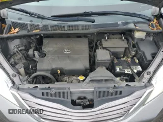2015 Toyota Sienna LE AAS with VIN 5TDKK3DC1FS577795, listed as a Copart auction lot 66215355 with 197,902 mi miles and Salvage title. Bid and sale history available at DreamBid. Image 12.