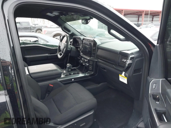 2023 Ford F-150 XL with VIN 1FTFW1E81PFD03857, listed as a IAAI auction lot 41338585 with 9,195 mi miles. Bid and sale history available at carsss.com. Image 5.