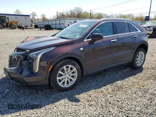 2021 Cadillac XT4 AWD Luxury z VIN 1GYFZBR47MF022799, wystawiony jako Copart lot #53638315 z przebiegiem 21 823 mil mil oraz Szkoda całkowita • Salvage title. Historia ofert i sprzedaży dostępna na DreamBid. Obrazek 1.
