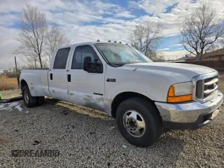 1999 Ford F-350 XL z VIN 1FTWW32F4XED65158, wystawiony jako Copart lot #41690765 z przebiegiem 147 314 mil mil oraz Czysty tytuł • Clean title. Historia ofert i sprzedaży dostępna na DreamBid. Obrazek 1.