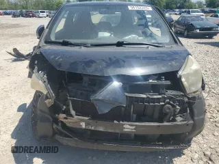 2012 Scion iQ z VIN JTNJJXB05CJ017720, wystawiony jako Copart lot #56152325 z przebiegiem 164 031 mil mil oraz Szkoda całkowita • Salvage title. Historia ofert i sprzedaży dostępna na DreamBid. Obrazek 5.