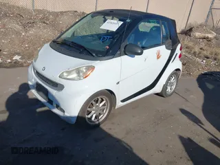 2009 Smart fortwo Passion with VIN WMEEK31X79K270472, listed as a IAAI auction lot 41365417 with 112,367 mi miles. Bid and sale history available at carsss.com. Image 2.