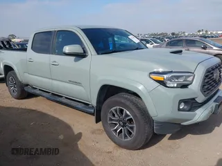 2022 Toyota Tacoma SR5 with VIN 3TMBZ5DN3NM034388, listed as a IAAI auction lot 42270543 with 179,904 mi miles and . Bid and sale history available at DreamBid. Image 1.