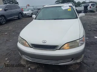 2001 Lexus ES 300 z VIN JT8BF28G410307451, wystawiony jako IAAI lot #42369871 z przebiegiem 290 620 mil mil oraz . Historia ofert i sprzedaży dostępna na DreamBid. Obrazek 12.