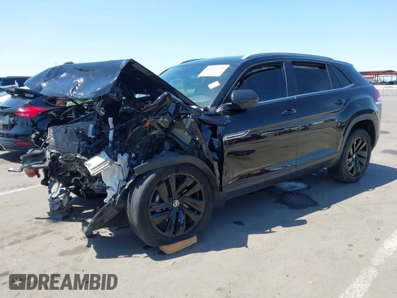 2022 Volkswagen Atlas SE z VIN 1V2KE2CA8NC220310, wystawiony jako IAAI lot #42218718 z przebiegiem 28 603 mil mil oraz . Historia ofert i sprzedaży dostępna na DreamBid. Obrazek 17.
