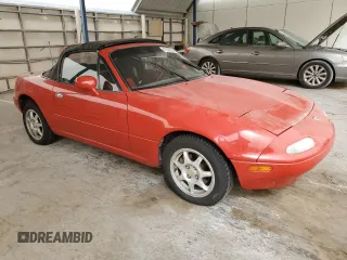 1994 Mazda MX-5 Miata with VIN JM1NA353XR0506259, listed as a Copart auction lot 47587295 with 209,443 mi miles and Salvage title. Bid and sale history available at DreamBid. Image 4.