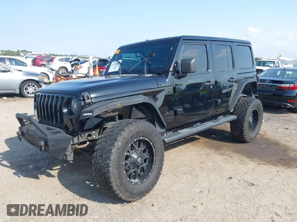 2020 Jeep Wrangler Unlimited Sahara with VIN 1C4HJXEG6LW211932, listed as a IAAI auction lot 42040546 with 74,732 mi miles and . Bid and sale history available at DreamBid. Image 2.