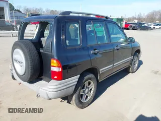 2003 Chevrolet Tracker with VIN 2CNBE13C736921273, listed as a IAAI auction lot 41453815 with 150,768 mi miles and . Bid and sale history available at DreamBid. Image 4.