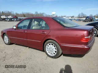2000 Mercedes-Benz E-Class with VIN WDBJF65J6YB052254, listed as a Copart auction lot 49375555 with 96,015 mi miles and Salvage Title. Bid and sale history available at carsss.com. Image 2.