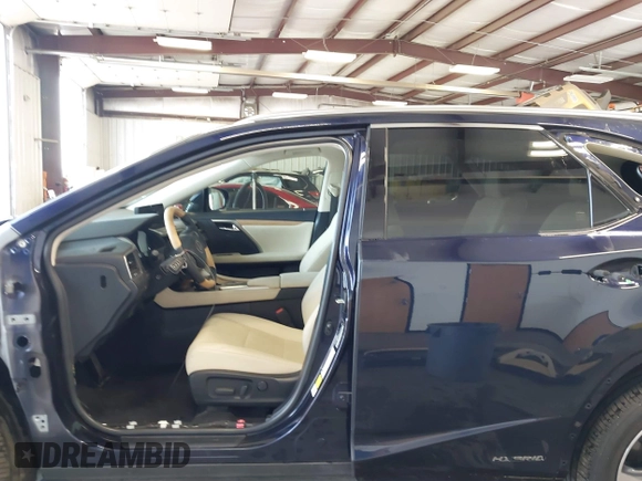 2022 Lexus RX 450hL с VIN JTJHGKFA1N2029039, выставлен на аукционе IAAI как лот 42569005 с пробегом 26 441 миль миль и . История ставок и продаж доступна на DreamBid. Изображение 15.