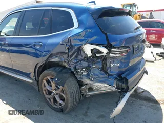 2023 BMW X3 sDrive30i z VIN 5UX43DP04P9P44100, wystawiony jako IAAI lot #42267136 z przebiegiem 28 618 mil mil oraz . Historia ofert i sprzedaży dostępna na DreamBid. Obrazek 6.