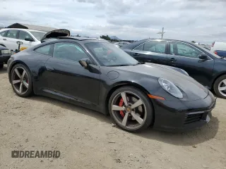 2024 Porsche 911 Carrera S with VIN WP0AB2A92RS218949, listed as a Copart auction lot 57306844 with 1,296 mi miles and Salvage Title. Bid and sale history available at carsss.com. Image 4.