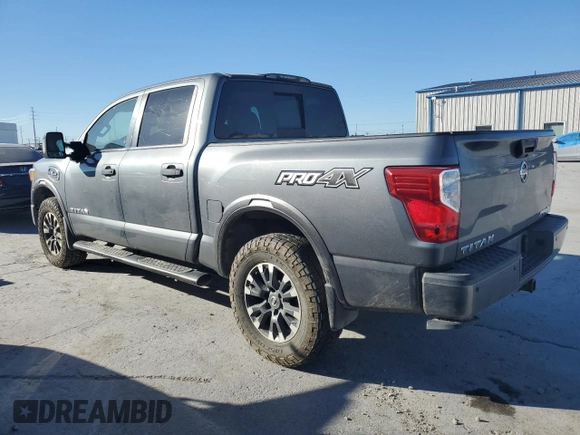 2017 Nissan Titan Platinum Reserve z VIN 1N6AA1E53HN543012, wystawiony jako Copart lot #39144854 z przebiegiem 83 008 mil mil oraz Szkoda całkowita • Salvage title. Historia ofert i sprzedaży dostępna na DreamBid. Obrazek 2.