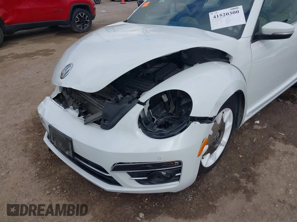 2019 Volkswagen Beetle S with VIN 3VWFD7AT2KM701622, listed as a IAAI auction lot 41520300 with Not provided miles and . Bid and sale history available at DreamBid. Image 6.