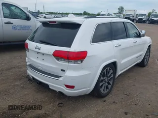 2017 Jeep Grand Cherokee Overland with VIN 1C4RJFCG6HC941771, listed as a IAAI auction lot 42356577 with 192,318 mi miles and . Bid and sale history available at DreamBid. Image 4.