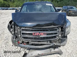 2015 GMC Yukon SLT with VIN 1GKS2BKC2FR666386, listed as a Copart auction lot 68471204 with 154,041 mi miles and Salvage Title. Bid and sale history available at carsss.com. Image 5.