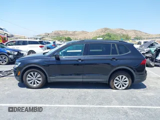 2019 Volkswagen Tiguan S с VIN 3VV1B7AX0KM027381, выставлен на аукционе IAAI как лот 42332275 с пробегом 48 632 миль миль и . История ставок и продаж доступна на DreamBid. Изображение 14.