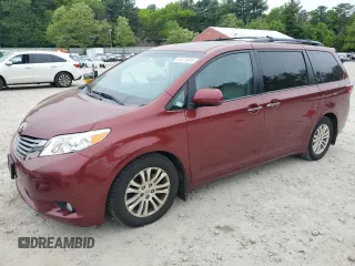 2015 Toyota Sienna XLE with VIN 5TDYK3DC1FS648469, listed as a Copart auction lot 57471975 with 118,567 mi miles and Non repairable. Bid and sale history available at DreamBid. Image 1.