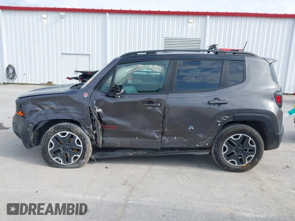 2017 Jeep Renegade Deserthawk with VIN ZACCJBCB2HPF51653, listed as a IAAI auction lot 41994419 with 115,444 mi miles and . Bid and sale history available at DreamBid. Image 14.