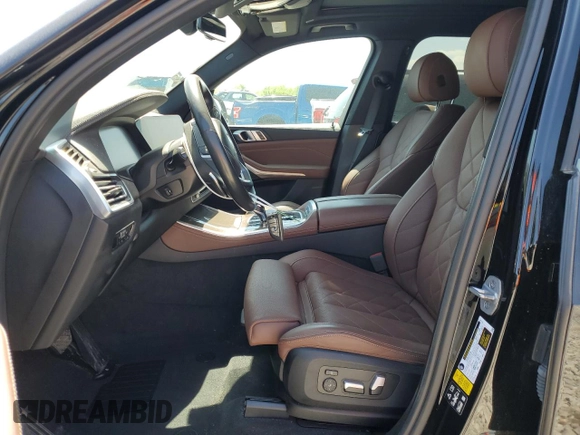 2023 BMW X5 xDrive40i with VIN 5UXCR6C08P9R06807, listed as a Copart auction lot 52030505 with 43,600 mi miles and Salvage title. Bid and sale history available at DreamBid. Image 7.