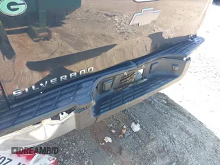 2013 Chevrolet Silverado 1500 Work Truck with VIN 1GCNCPEX8DZ263575, listed as a IAAI auction lot 41875007 with 133,318 mi miles and . Bid and sale history available at DreamBid. Image 6.