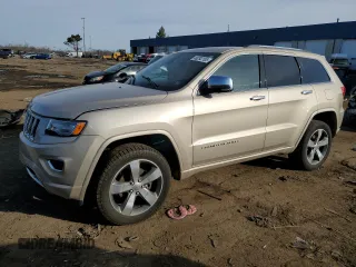 2015 Jeep Grand Cherokee Overland with VIN 1C4RJFCG9FC681699, listed as a Copart auction lot 49292195 with 144,133 mi miles and Clean Title. Bid and sale history available at carsss.com. Image 1.
