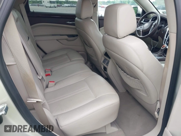 2015 Cadillac SRX Performance Collection with VIN 3GYFNCE34FS639168, listed as a IAAI auction lot 42191995 with 101,358 mi miles and . Bid and sale history available at DreamBid. Image 8.