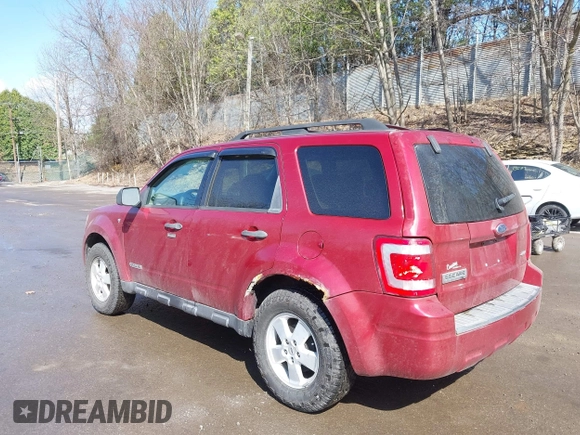 2008 Ford Escape XLT with VIN 1FMCU93108KC15674, listed as a IAAI auction lot 42049019 with 180,077 mi miles. Bid and sale history available at carsss.com. Image 3.