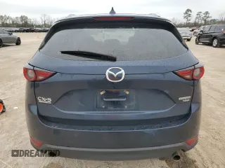 2021 Mazda CX-5 Signature with VIN JM3KFBEY9M0343758, listed as a Copart auction lot 46469785 with 41,757 mi miles and Salvage Title. Bid and sale history available at carsss.com. Image 6.