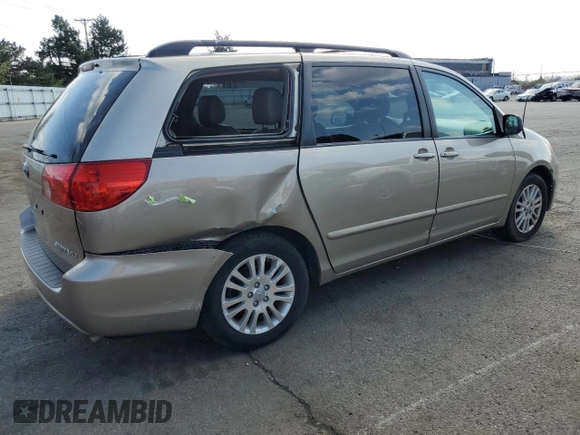2010 Toyota Sienna XLE with VIN 5TDYK4CCXAS330463, listed as a Copart auction lot 52581315 with 226,668 mi miles and Salvage Title. Bid and sale history available at carsss.com. Image 3.