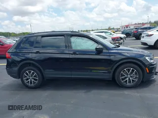 2021 Volkswagen Tiguan S z VIN 3VV1B7AX7MM116609, wystawiony jako IAAI lot #42206016 z przebiegiem 47 049 mil mil oraz . Historia ofert i sprzedaży dostępna na DreamBid. Obrazek 13.