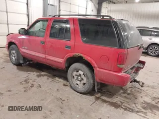 2004 Chevrolet Blazer LS z VIN 1GNDT13X34K157353, wystawiony jako IAAI lot #41089017 z przebiegiem 104 539 mil mil oraz . Historia ofert i sprzedaży dostępna na DreamBid. Obrazek 3.