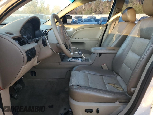 2005 Mercury Montego Luxury z VIN 1MEFM40195G608644, wystawiony jako Copart lot #83732794 z przebiegiem 231 619 mil mil oraz Szkoda całkowita • Salvage title. Historia ofert i sprzedaży dostępna na DreamBid. Obrazek 7.