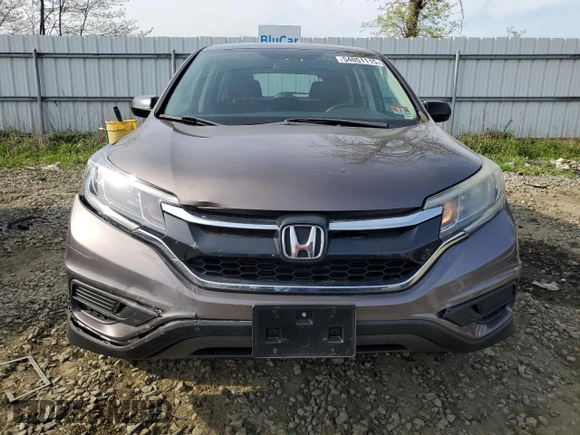 2015 Honda CR-V LX with VIN 5J6RM4H34FL086514, listed as a Copart auction lot 54051115 with 90,139 mi miles and Salvage Title. Bid and sale history available at DreamBid. Image 5.