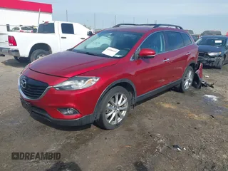 2015 Mazda CX-9 Grand Touring with VIN JM3TB3DA7F0448943, listed as a IAAI auction lot 41888414 with 104,052 mi miles. Bid and sale history available at carsss.com. Image 2.