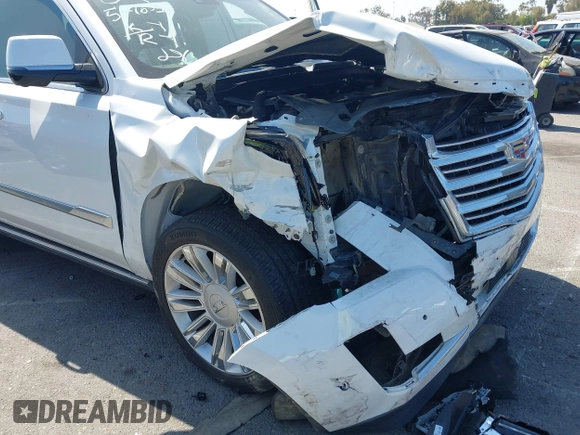 2017 Cadillac Escalade Platinum z VIN 1GYS4DKJ4HR223704, wystawiony jako IAAI lot #42303763 z przebiegiem 82 971 mil mil oraz . Historia ofert i sprzedaży dostępna na DreamBid. Obrazek 6.