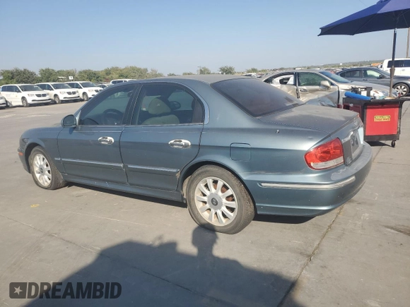 2004 Hyundai Sonata GLS with VIN KMHWF35H74A041603, listed as a Copart auction lot 76204444 with 164,606 mi miles and Clean Title. Bid and sale history available at carsss.com. Image 2.