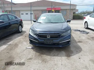 2019 Honda Civic LX with VIN 2HGFC2F61KH564474, listed as a IAAI auction lot 42156385 with 239,694 mi miles and . Bid and sale history available at DreamBid. Image 12.